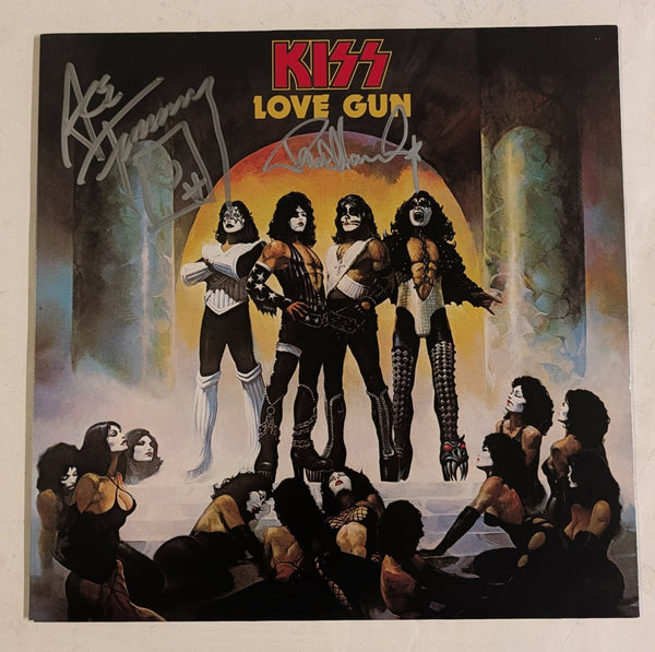 KISSONLINE KISS PAUL STANLEY and ACE FREHLEY signed LOVE GUN LP KOL EX colored vinyl