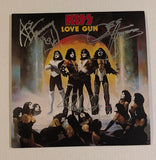 KISSONLINE KISS PAUL STANLEY GENE SIMMONS and ACE FREHLEY signed LOVE GUN LP KOL EX colored vinyl