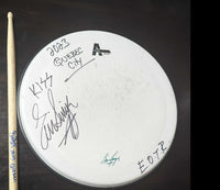 Eric Singer 2023 EOTR Stage-Used Signed Drumheads and Drumstick Combo